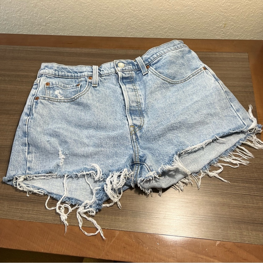 Levi’s 501 button closure distressed shorts raw hemline